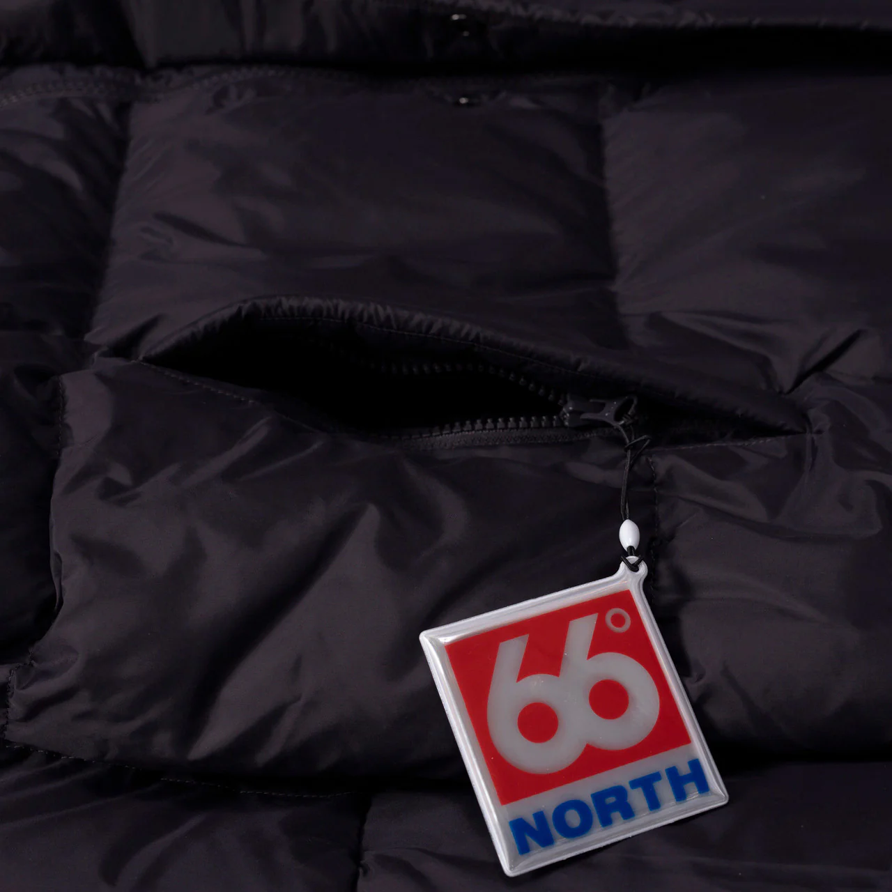 Dyngja Down Jacket - Image 9